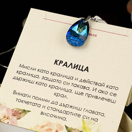 Сребърно колие с капковиден син кристал Swarovski и ръчна инкрустация